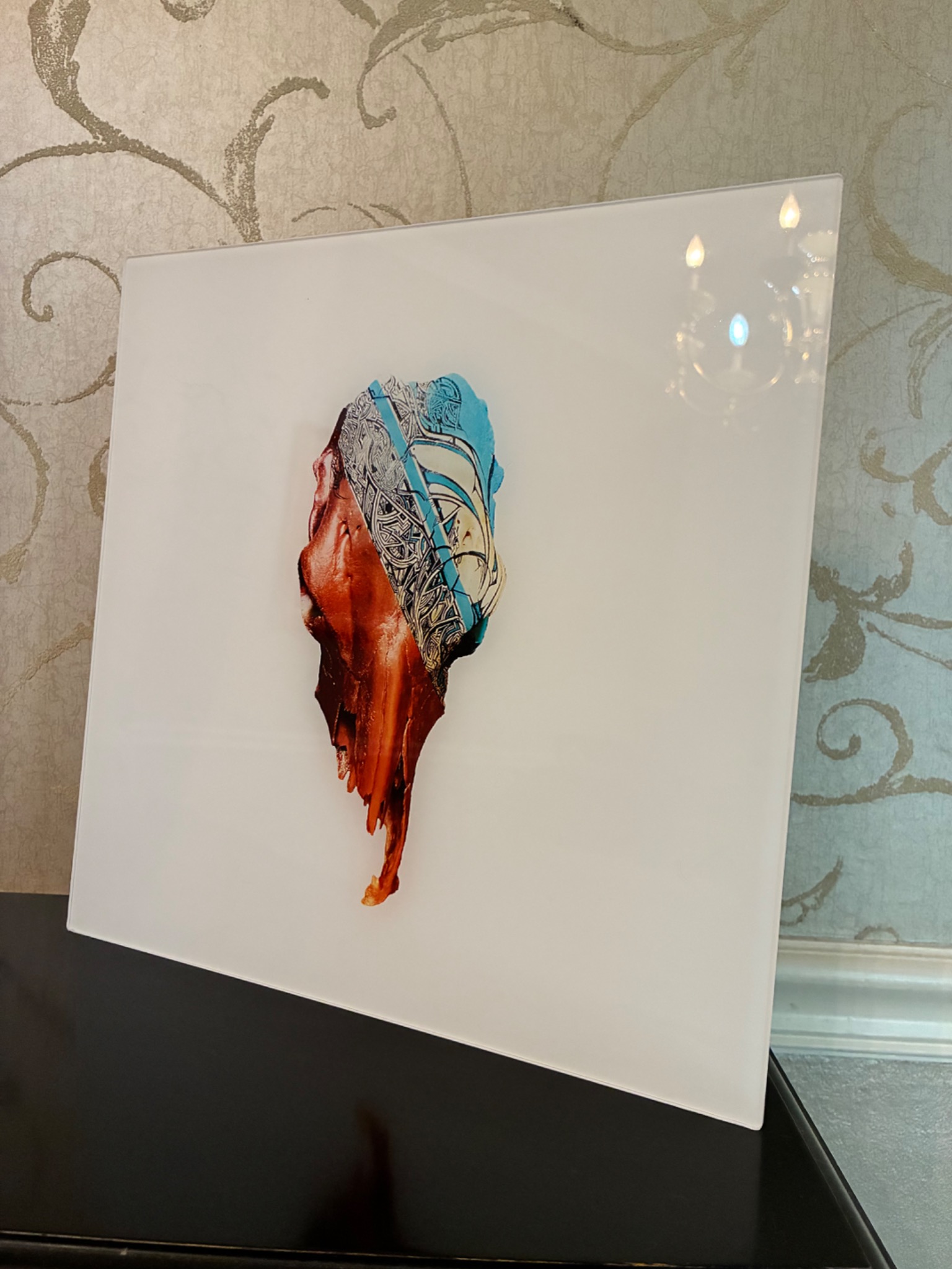 Actual 12 by 12 inch Slake & Recompense acrylic sample shown at an angle
